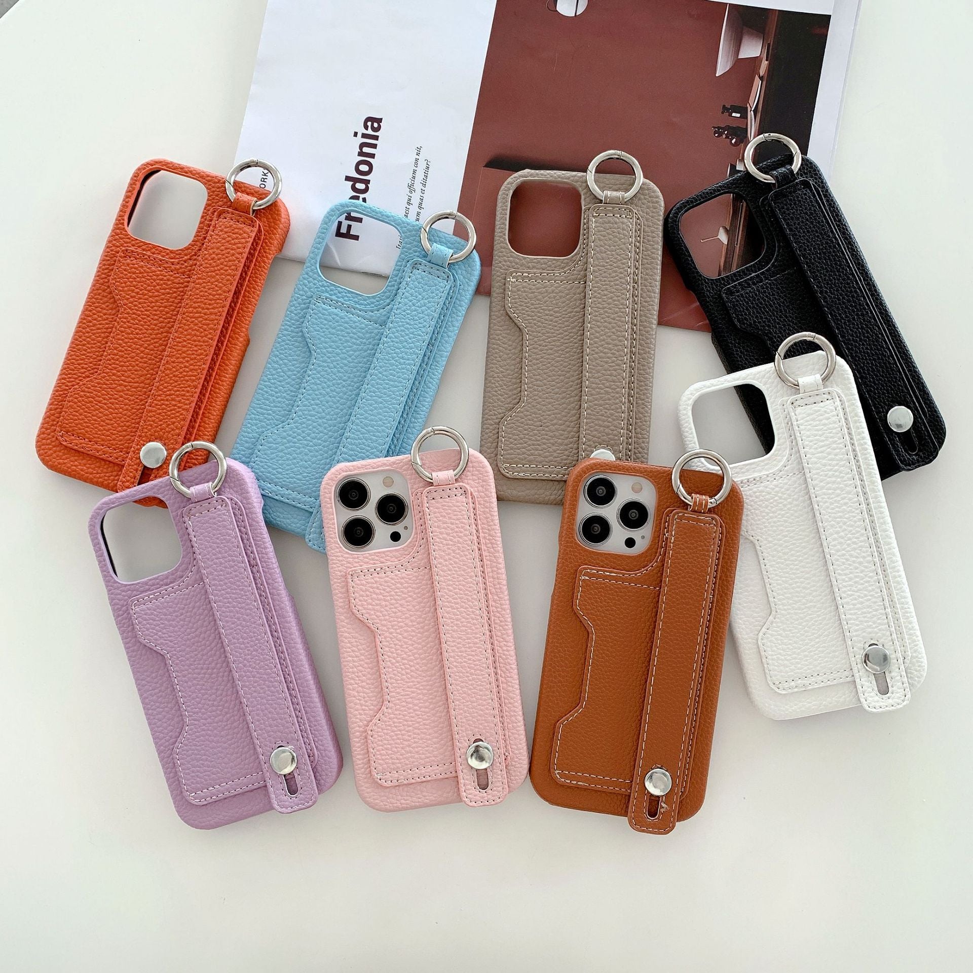 Leather phone case suitable for iPhone, with card slot and wrist strap protection