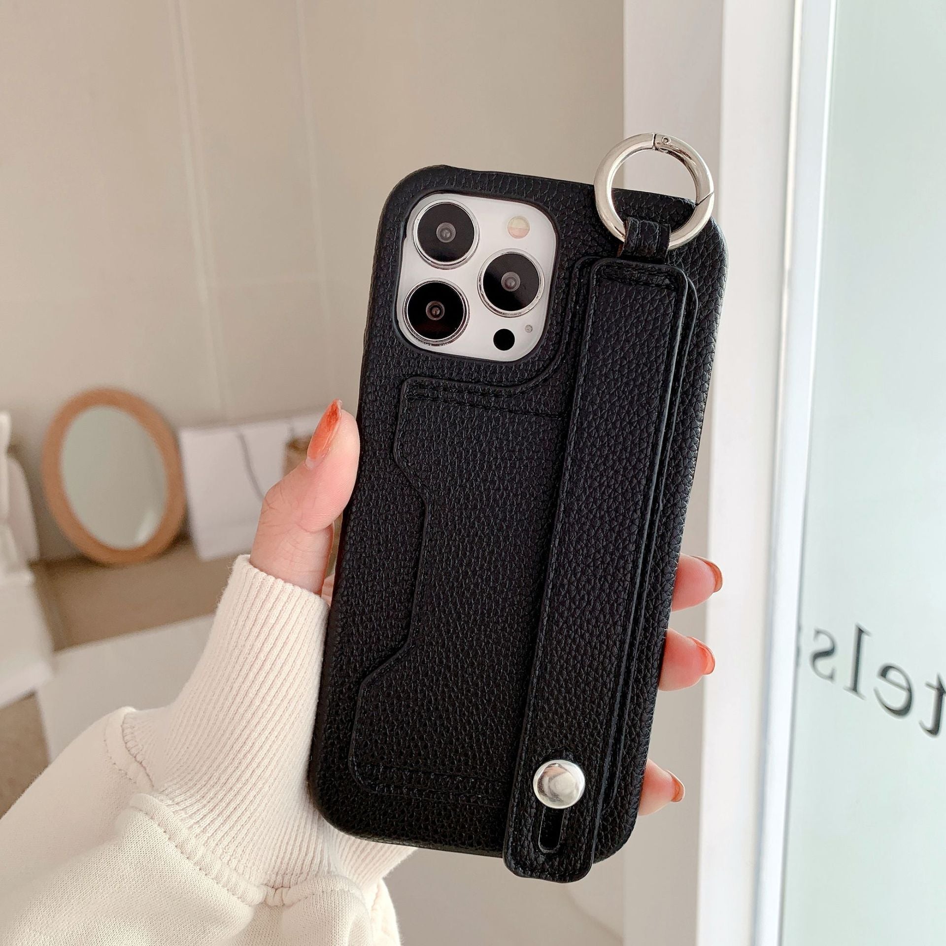 Leather phone case suitable for iPhone, with card slot and wrist strap protection