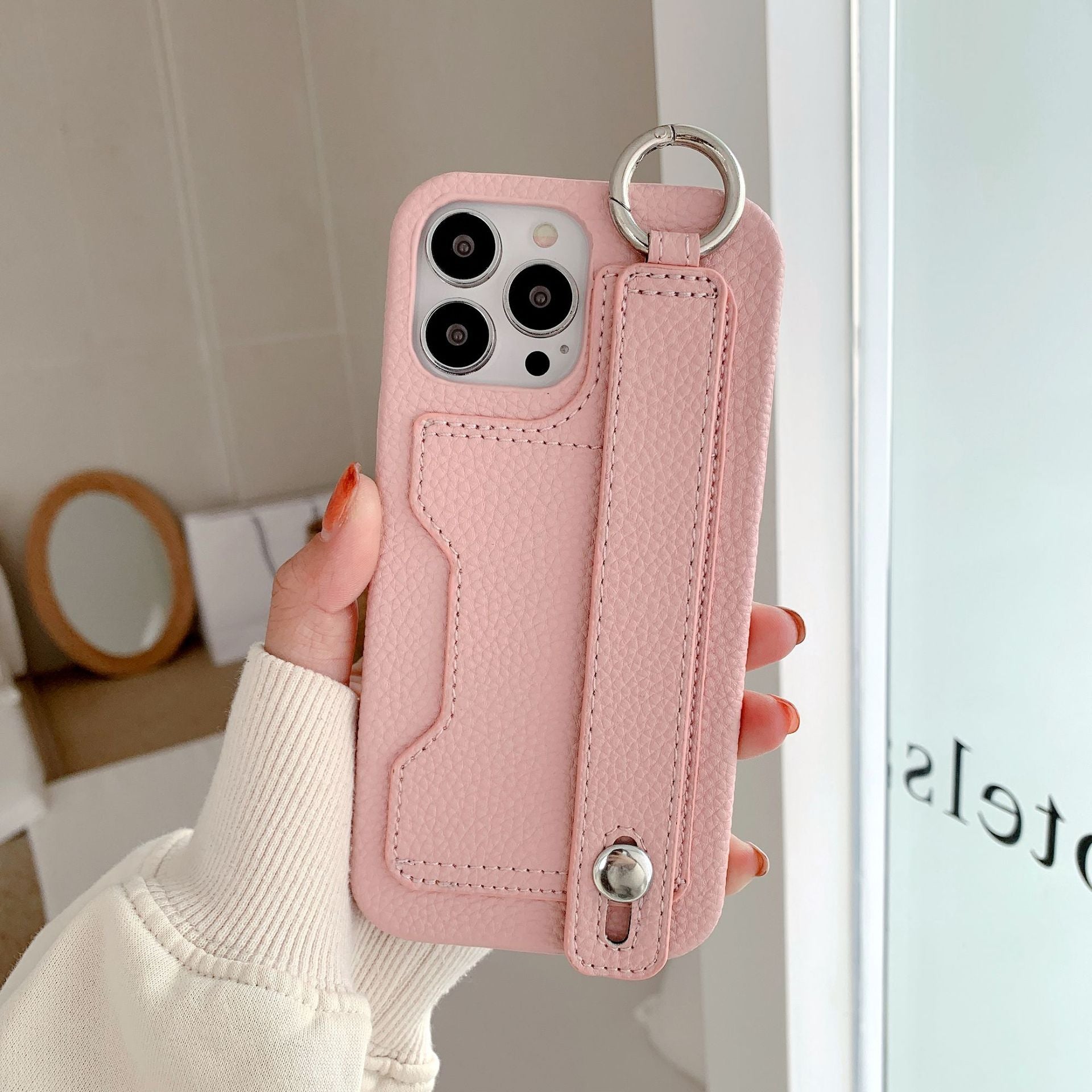Leather phone case suitable for iPhone, with card slot and wrist strap protection